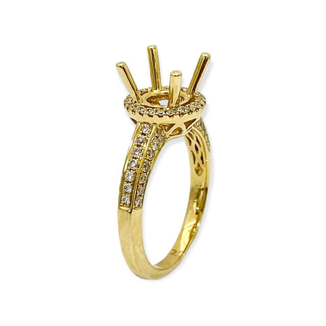 Yellow gold round diamond halo engagement ring with a round center diamond