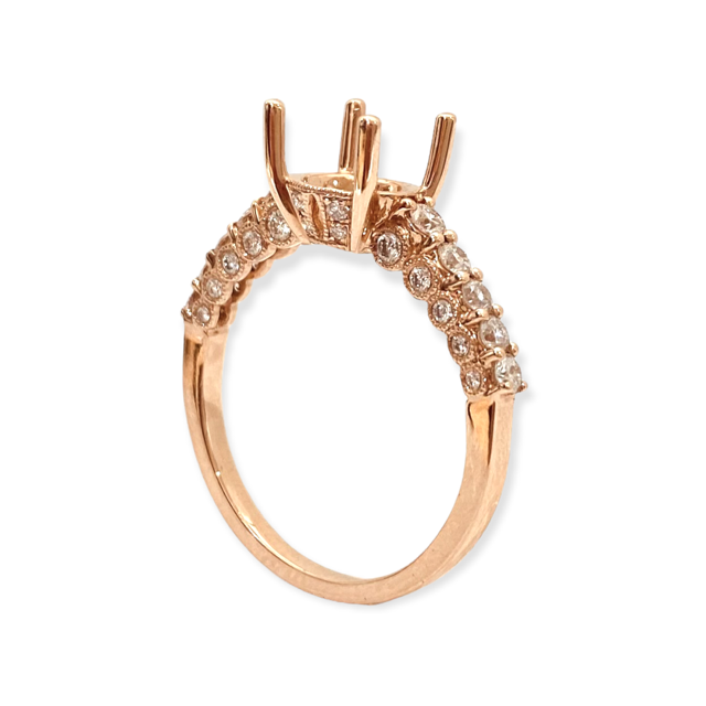 Profile of a yellow gold halo diamond ring semi-mount marked 585