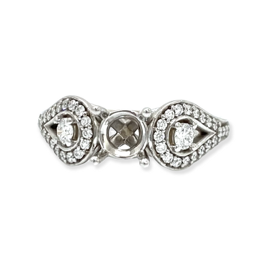 White gold three-stone ring semi-mount with two diamond halos flanking an empty center