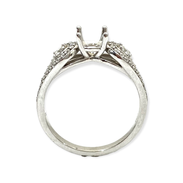 Front profile of a white gold three-stone diamond ring semi-mount with empty center