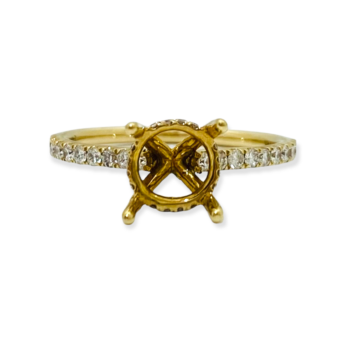 Yellow gold four-prong diamond ring semi-mount with a pave diamond band