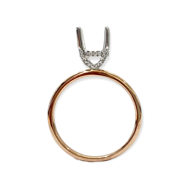 White gold oval diamond halo engagement ring with a pave diamond band