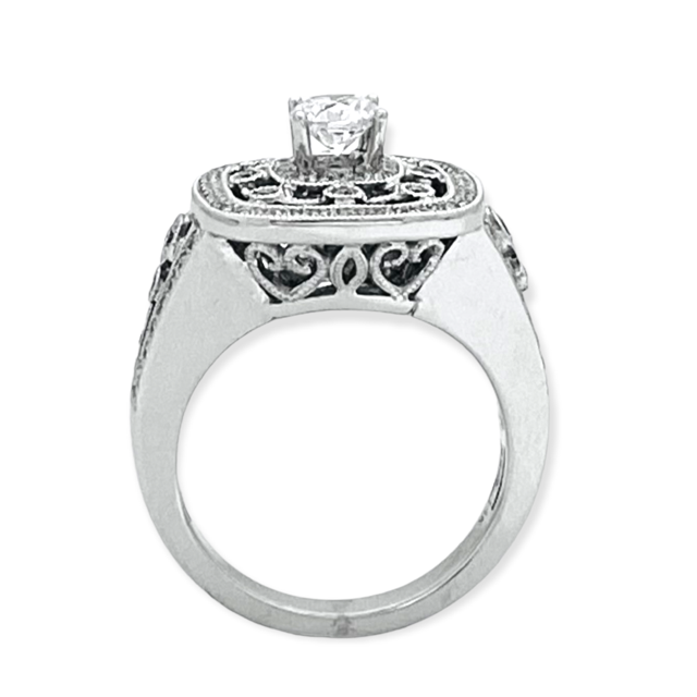 18K white gold diamond engagement ring with round center stone and rectangular filigree halo