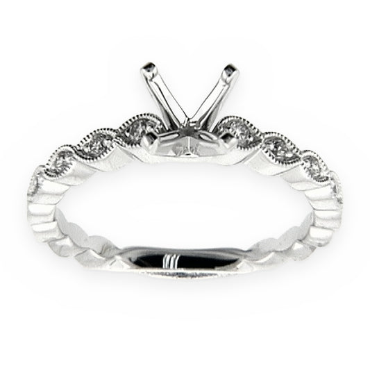White gold diamond engagement ring semi-mount with marquise-shaped milgrain accents and empty four-prong head