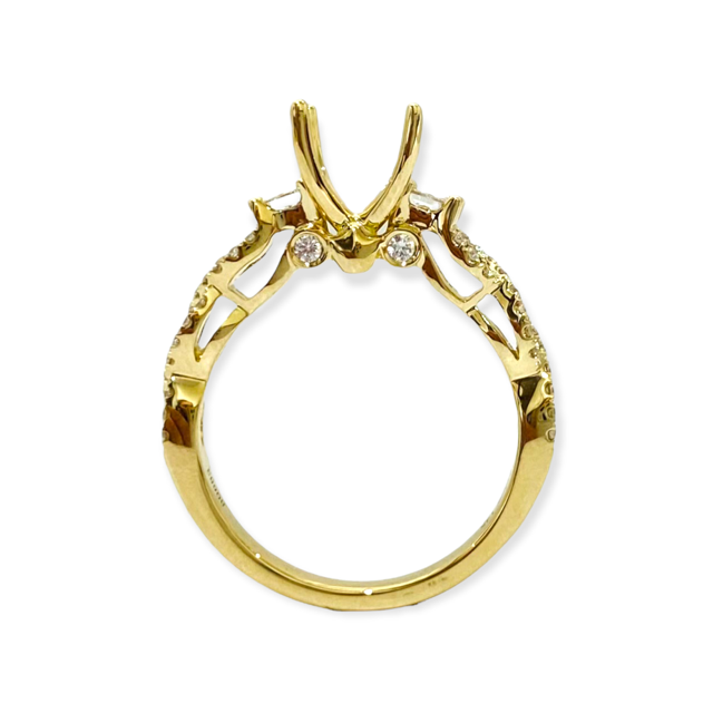Yellow gold diamond engagement ring semi-mount viewed from the front with empty prong head and twisted diamond band