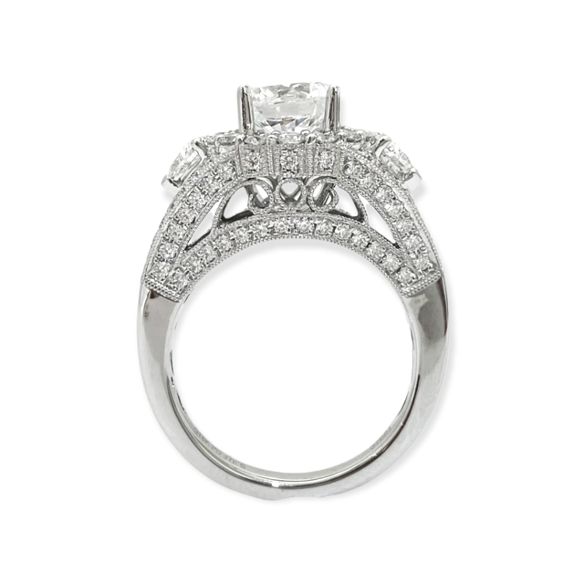 White gold cushion diamond halo engagement ring profile view showing ornate milgrain gallery