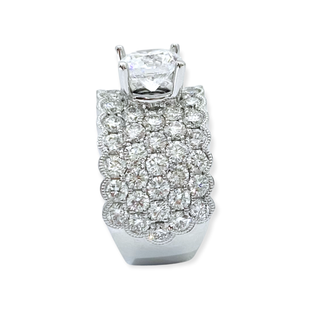 White gold wide multi-row pave diamond ring viewed from the top showing scalloped edges