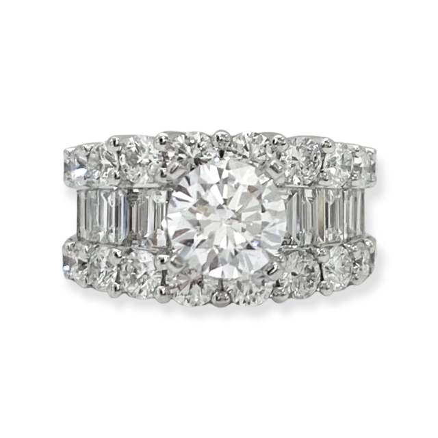 White gold round diamond ring with round diamond halo rows and baguette side channels