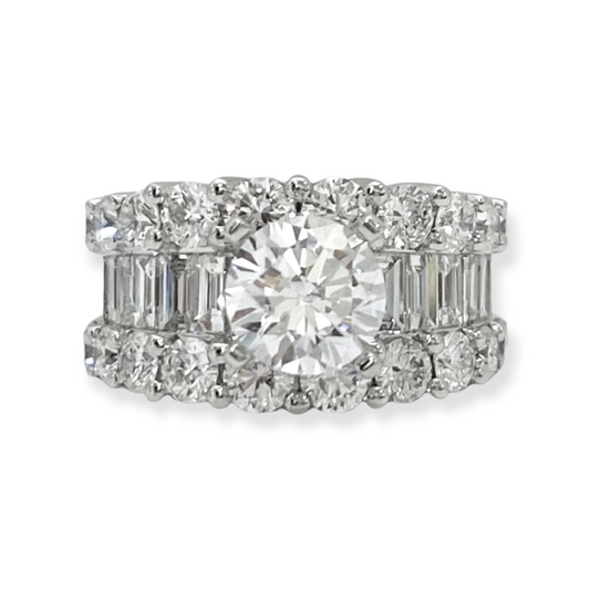 White gold round diamond ring with round diamond halo rows and baguette side channels