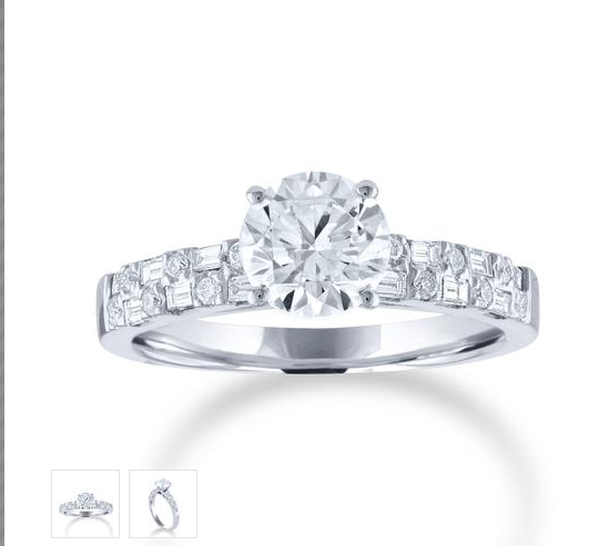 White gold round diamond engagement ring with two rows of alternating round and baguette diamonds on the band