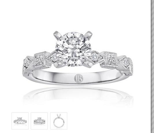 White gold round diamond engagement ring with vintage geometric milgrain diamond stations on the band
