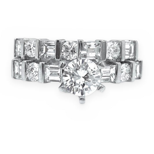 White gold diamond bridal set with round solitaire engagement ring and baguette-and-round diamond wedding band