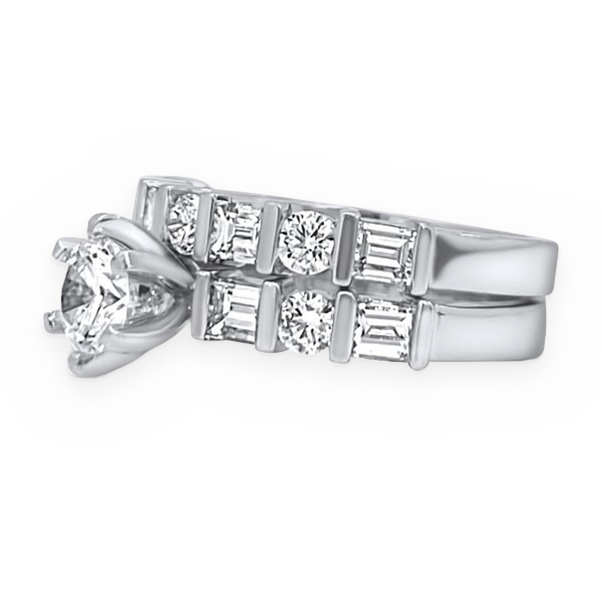 White gold diamond engagement ring with round solitaire and bar-set baguette and round diamond shoulders, side view