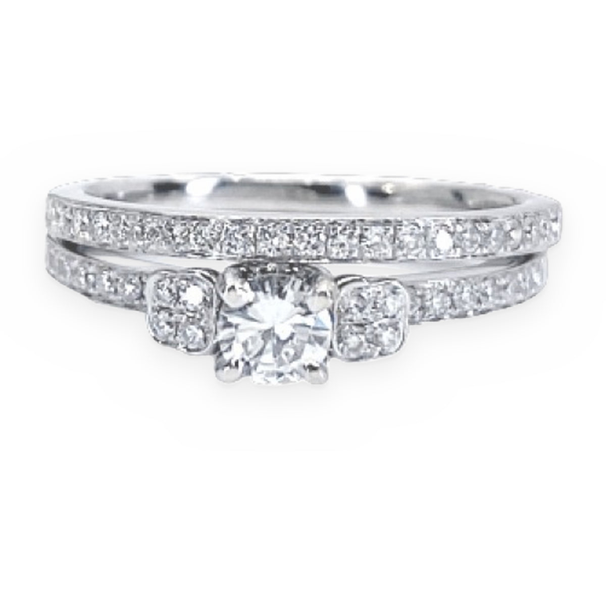 White gold round diamond engagement ring with pave-set shoulders and band