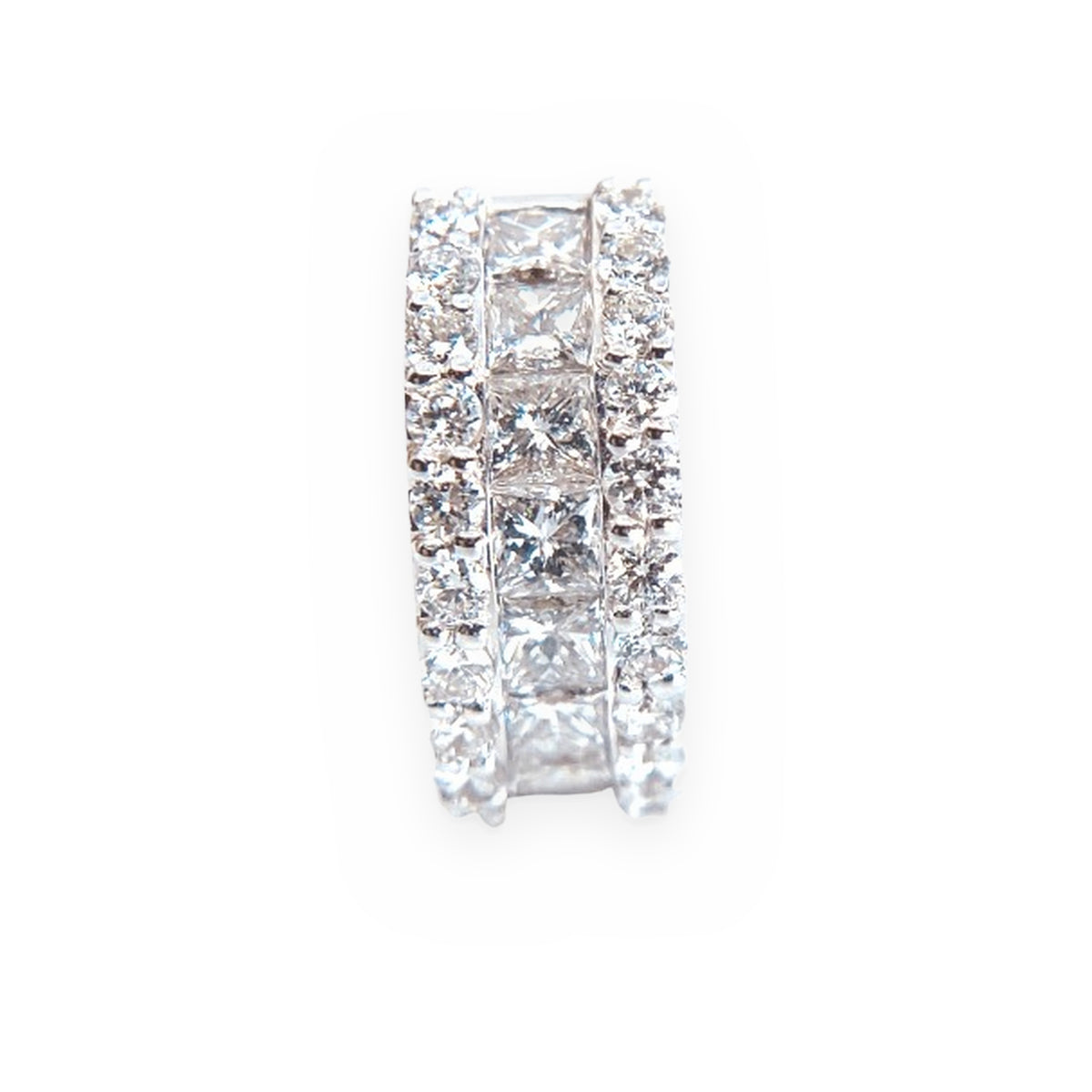 White gold princess-cut and round diamond hoop earring shown edge-on