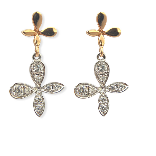 Two-tone gold floral drop earrings with pear-shaped diamond petals