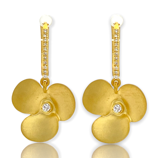 Yellow gold flower drop earrings with diamond-accented bar and bezel center