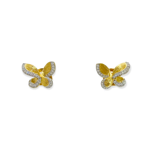 Two-tone gold butterfly stud earrings with diamond-outlined wings
