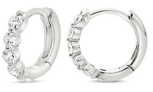 White gold diamond huggie hoop earrings with graduated stones