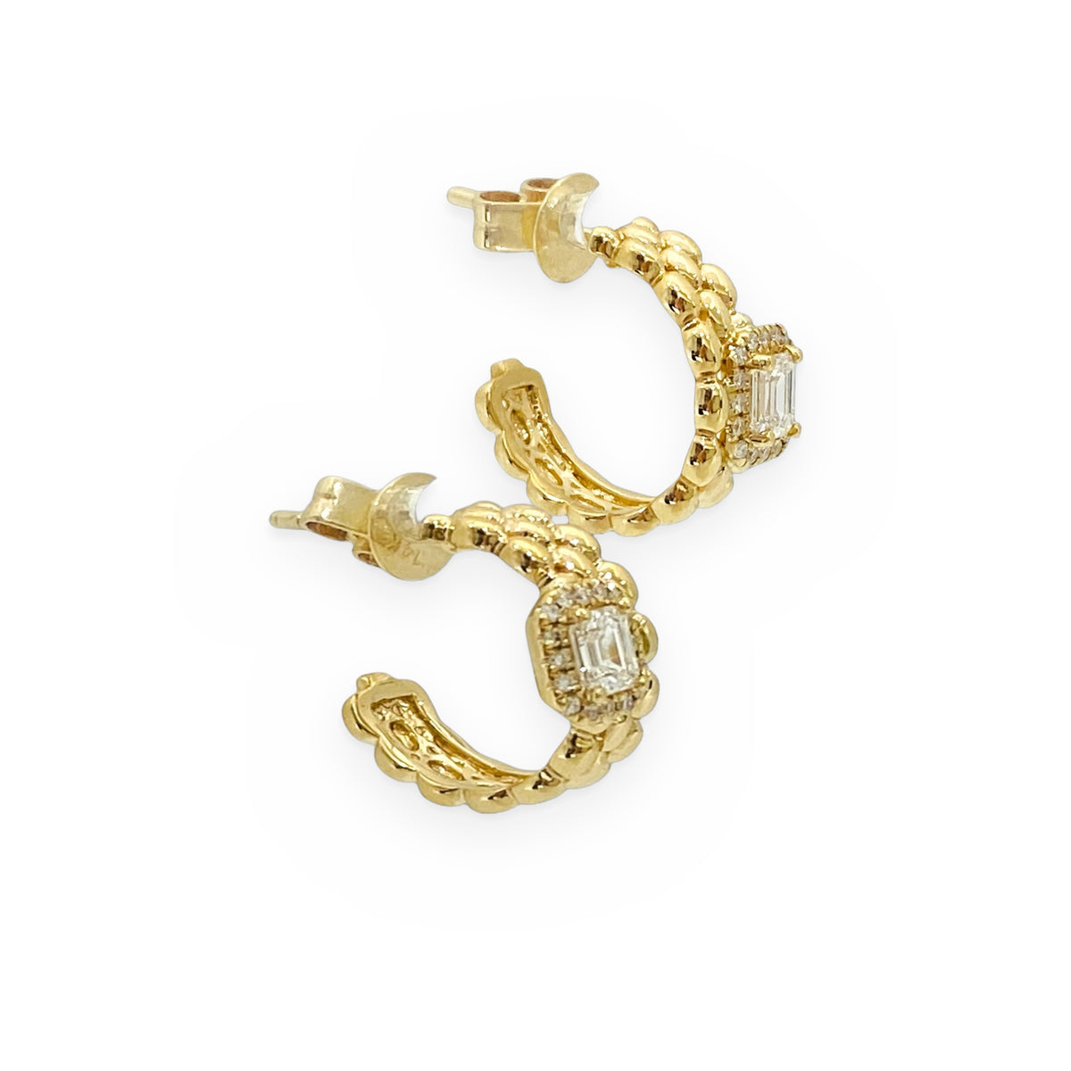 Yellow gold beaded huggie earrings with emerald-cut diamond, side view