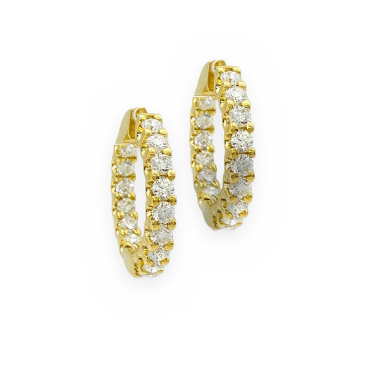 Yellow gold diamond inside-out oval hoop earrings