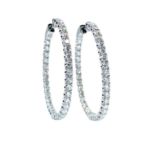 White gold diamond inside-out oval hoop earrings