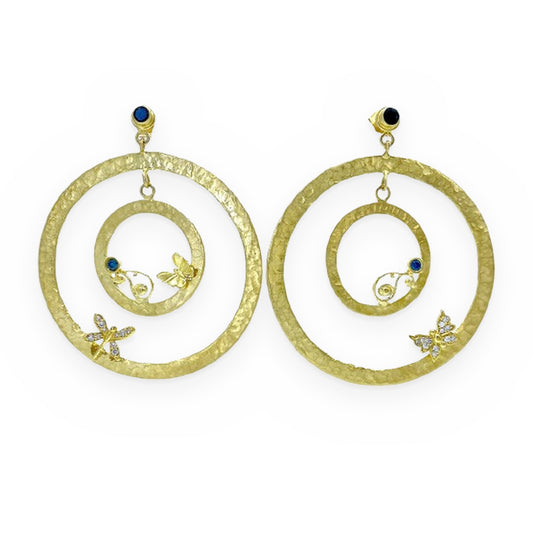 Yellow gold hammered concentric circle earrings with sapphire and butterfly accents
