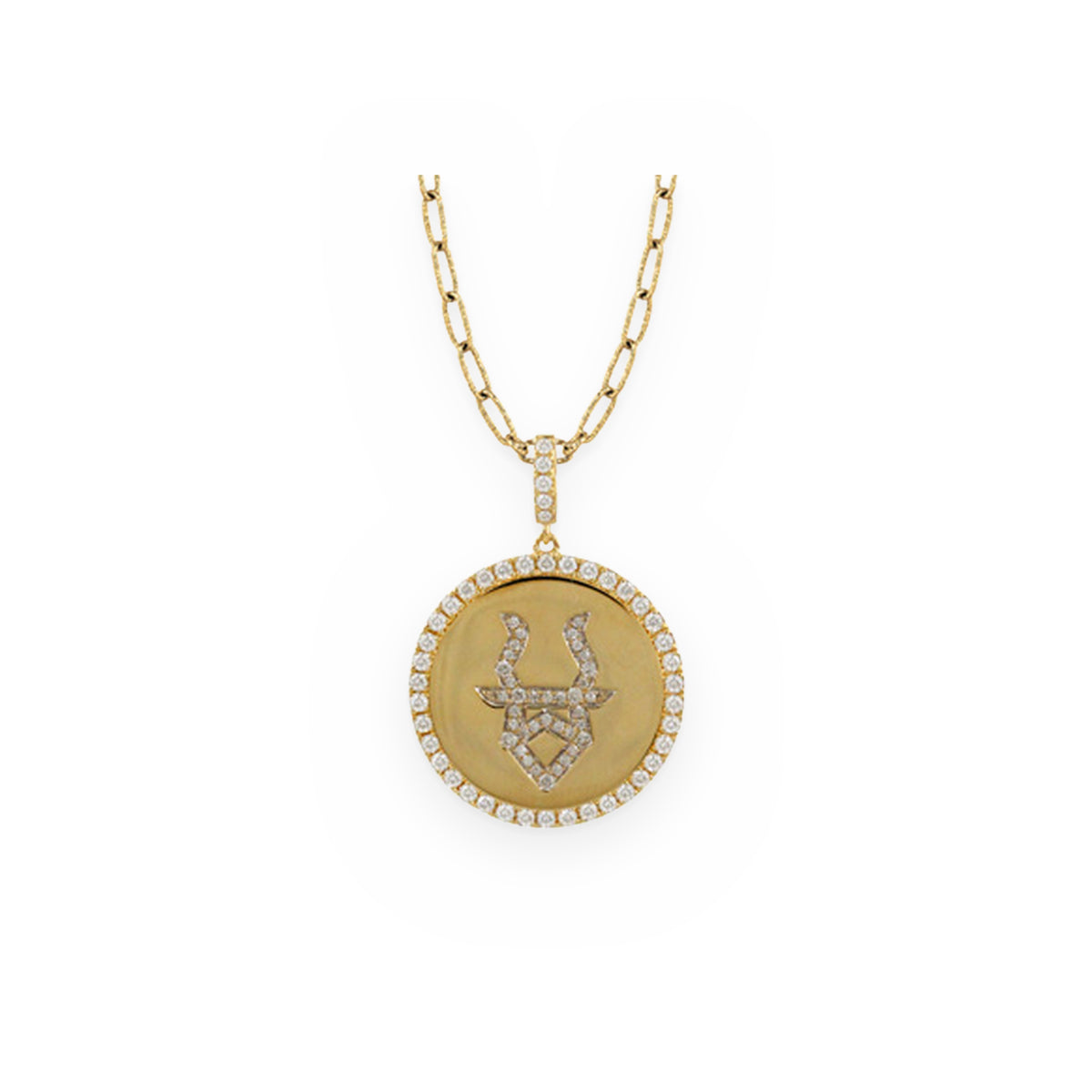 Yellow gold and diamond Taurus zodiac medallion pendant on a paperclip chain