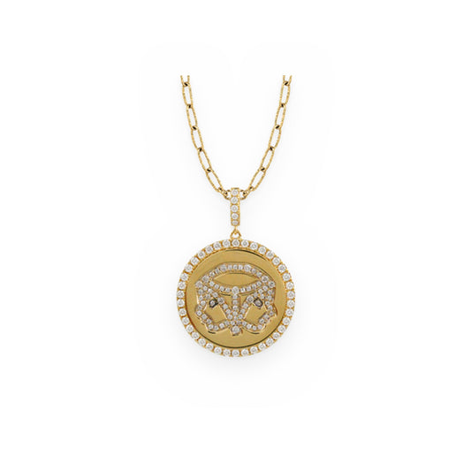 Yellow gold and diamond Gemini zodiac medallion pendant on a paperclip chain