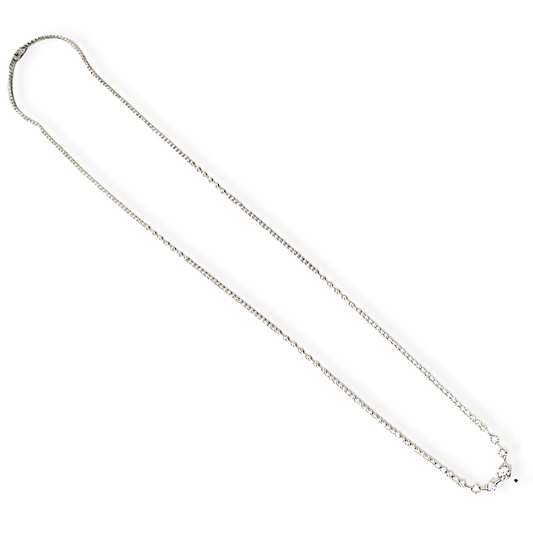 Two-tone gold diamond open-circle pendant with a yellow gold flower on a cable chain