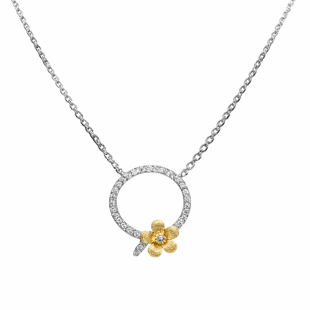 White gold solitaire diamond pendant necklace on a cable chain