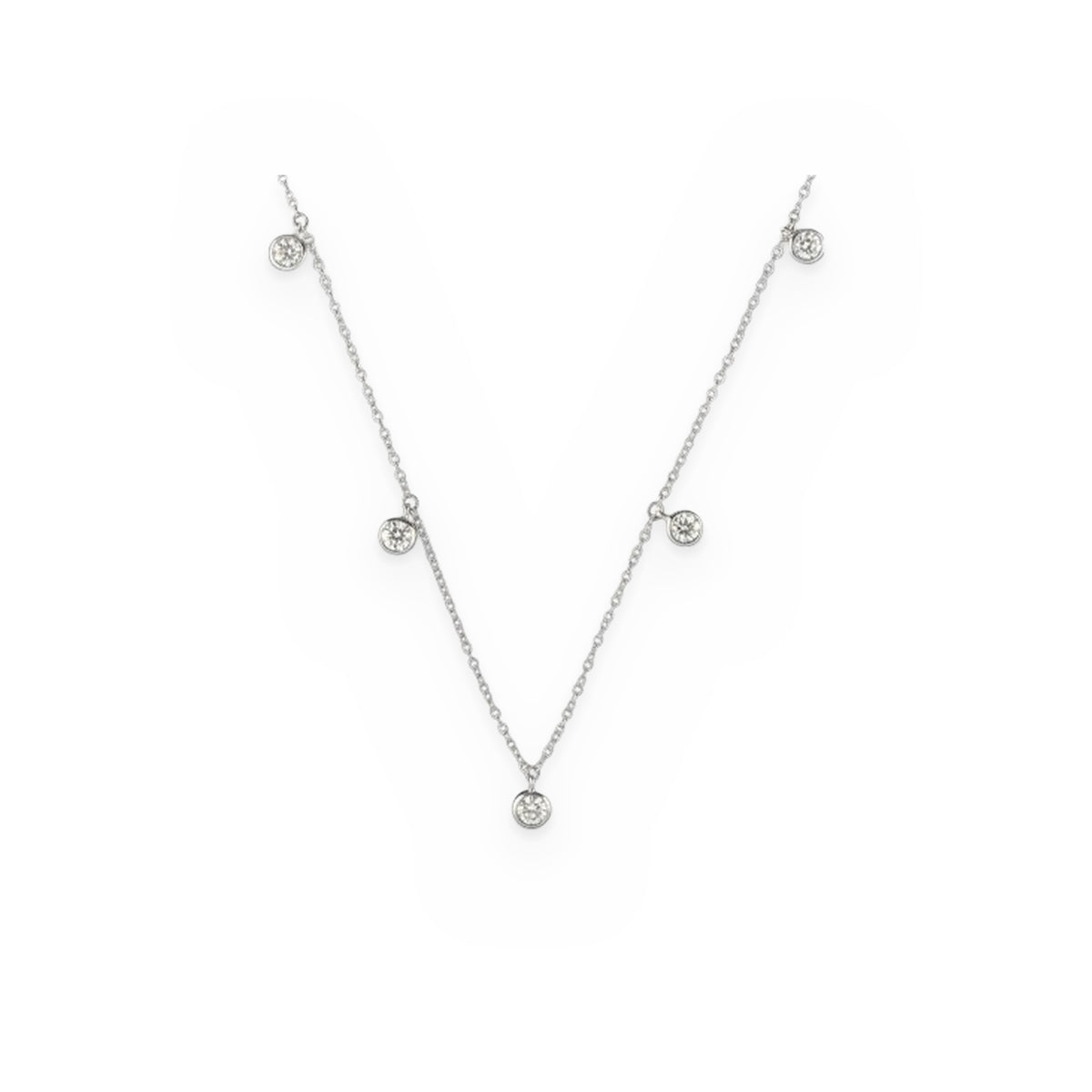 White gold diamond station necklace with five bezel-set round diamond drops
