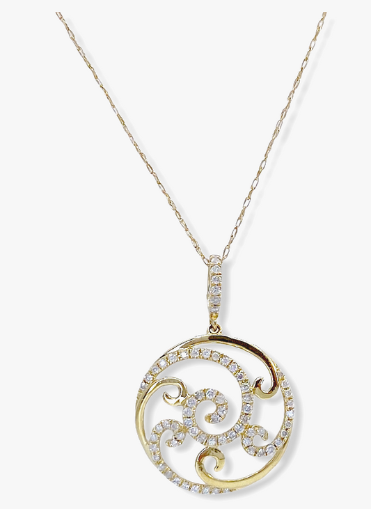 Yellow gold round pave diamond swirl pendant on a fine cable chain