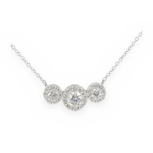 White gold three-stone diamond halo pendant necklace