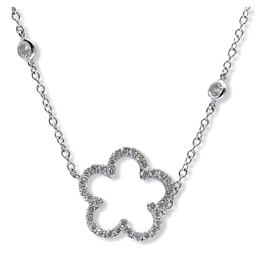 White gold open diamond flower-silhouette pendant on a diamond station chain