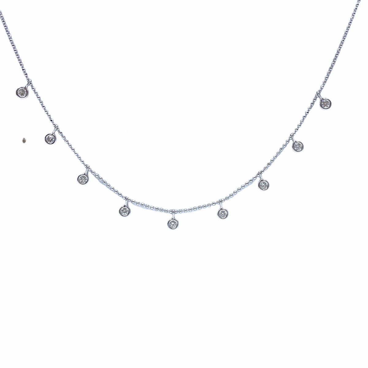 White gold beaded chain necklace with nine bezel-set diamond drop charms