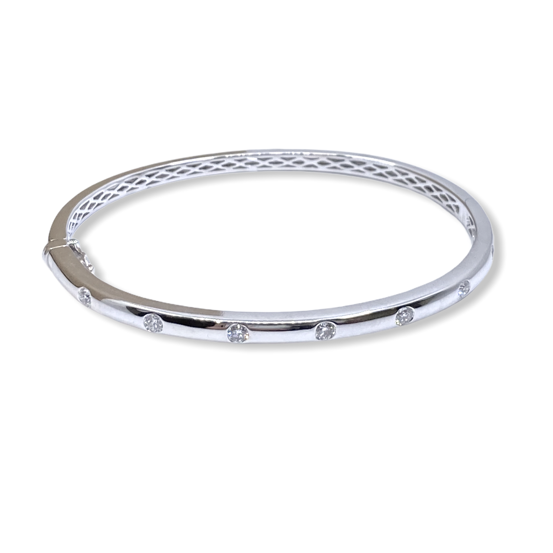 14K white gold bangle bracelet with flush-set round diamonds