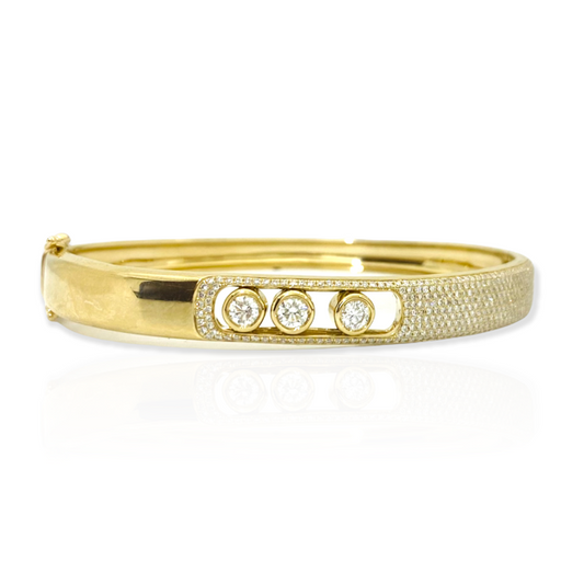 18K yellow gold bangle with pave and three sliding bezel-set diamonds