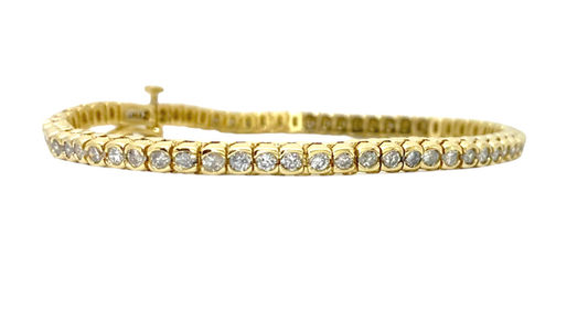 Yellow gold diamond tennis bracelet with bezel-set round diamonds
