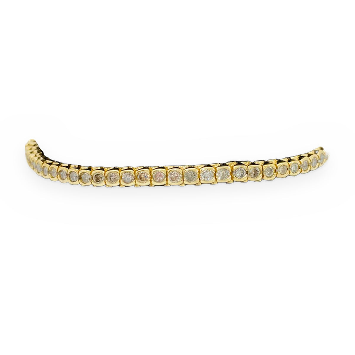 Yellow gold bezel-set diamond bracelet displayed on a black stand