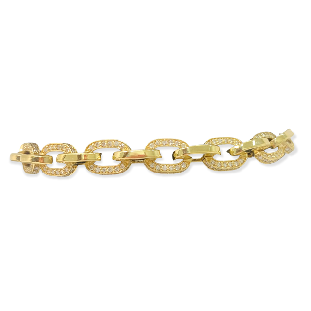 Close view of yellow gold pave diamond anchor link bracelet