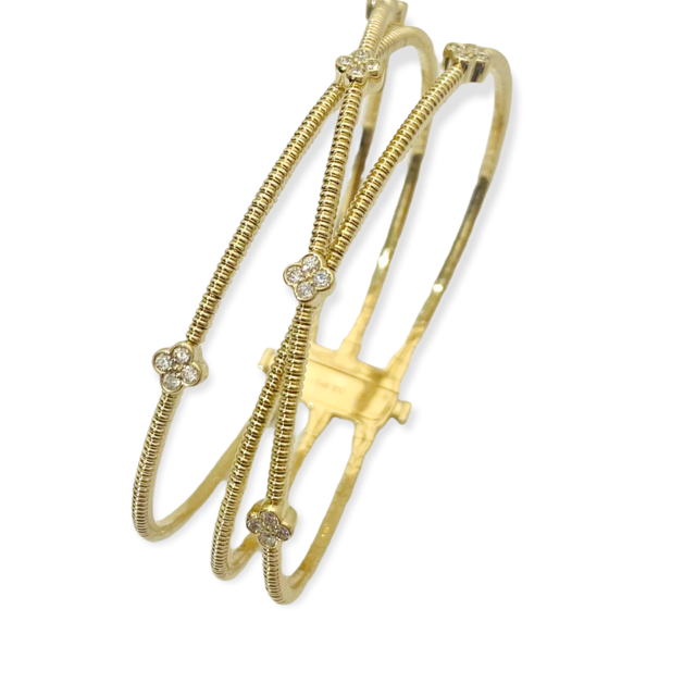 Yellow gold crossover diamond clover bangle showing clasp