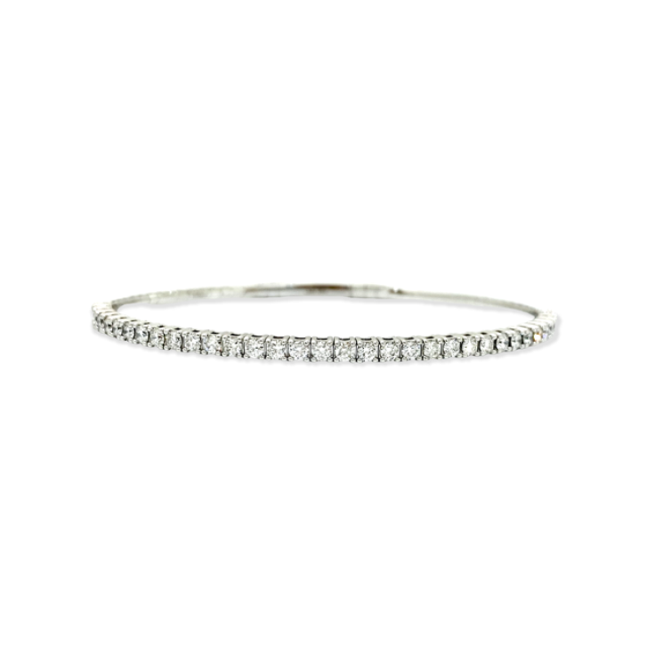 White gold flexible diamond bangle with prong-set round diamonds