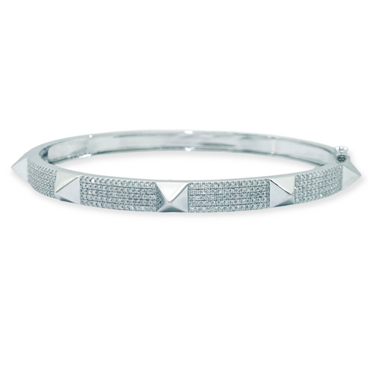 White gold pave diamond bangle with polished pyramid studs