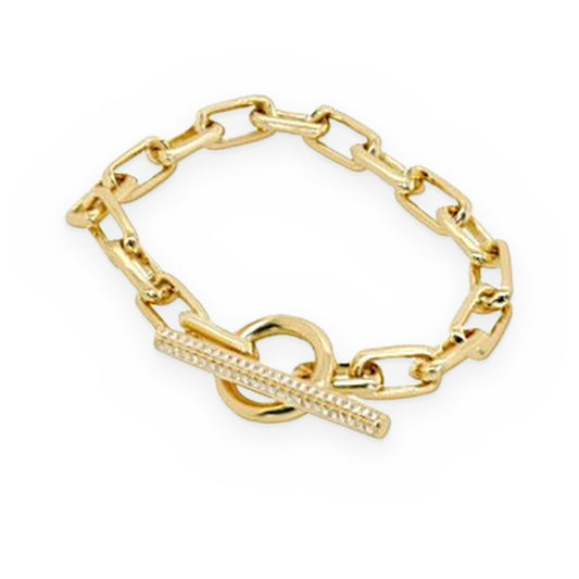 Yellow gold oval link bracelet with diamond pave toggle bar clasp