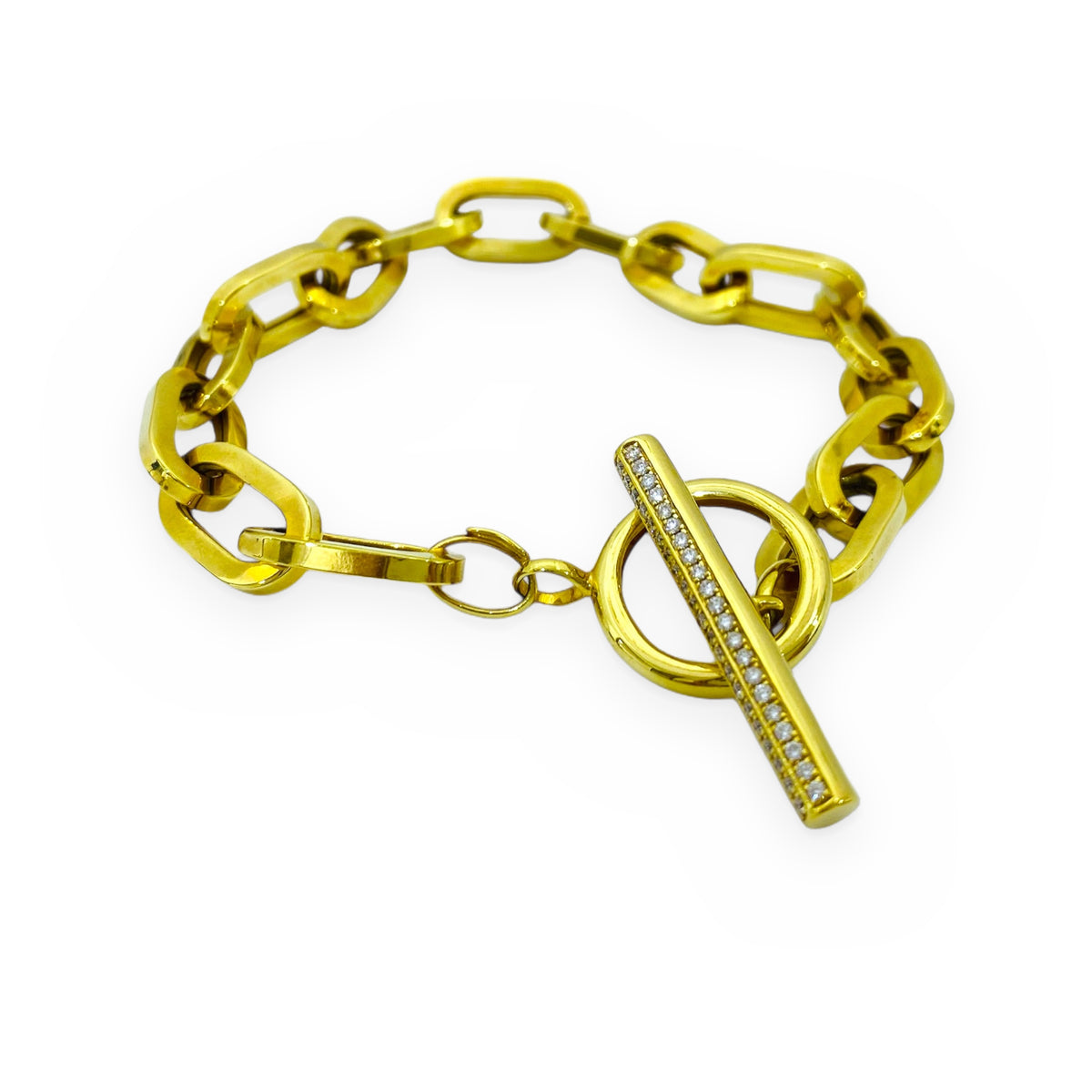 Yellow gold oval link toggle bracelet with diamond pave bar