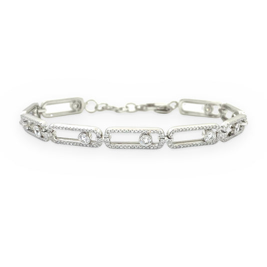 White gold open link bracelet with pave frames and floating bezel diamonds