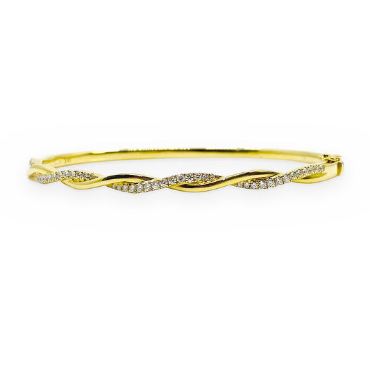 Yellow gold twisted rope bangle with pave diamond ribbon