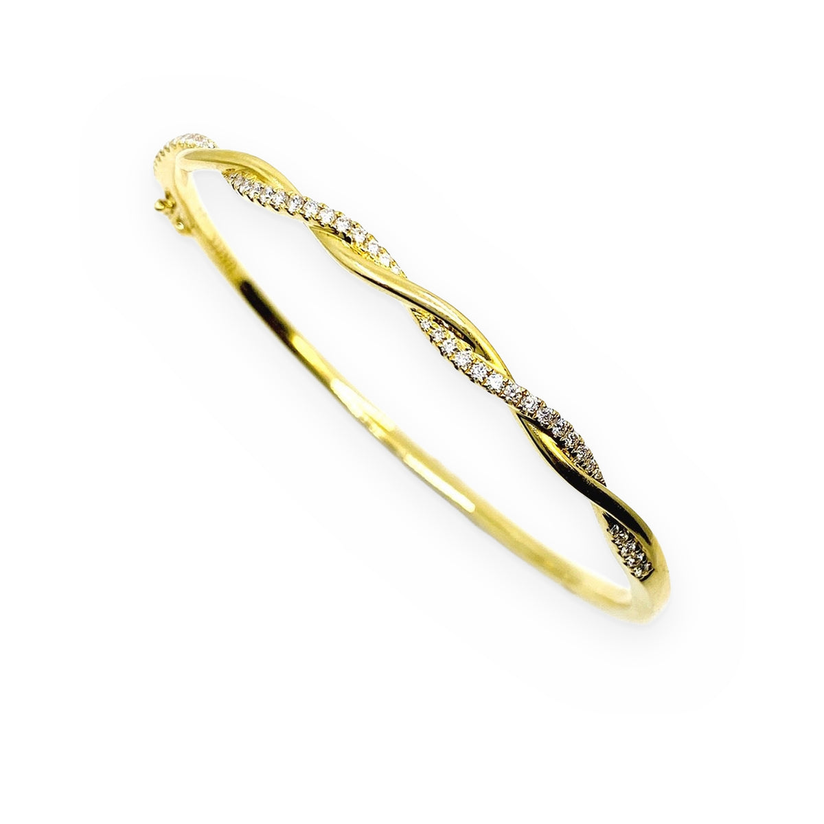 Yellow gold twisted rope bangle with pave diamond ribbon, angled view