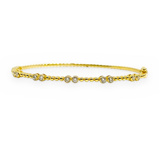 18K yellow gold beaded bangle bracelet with bezel-set round diamond accents
